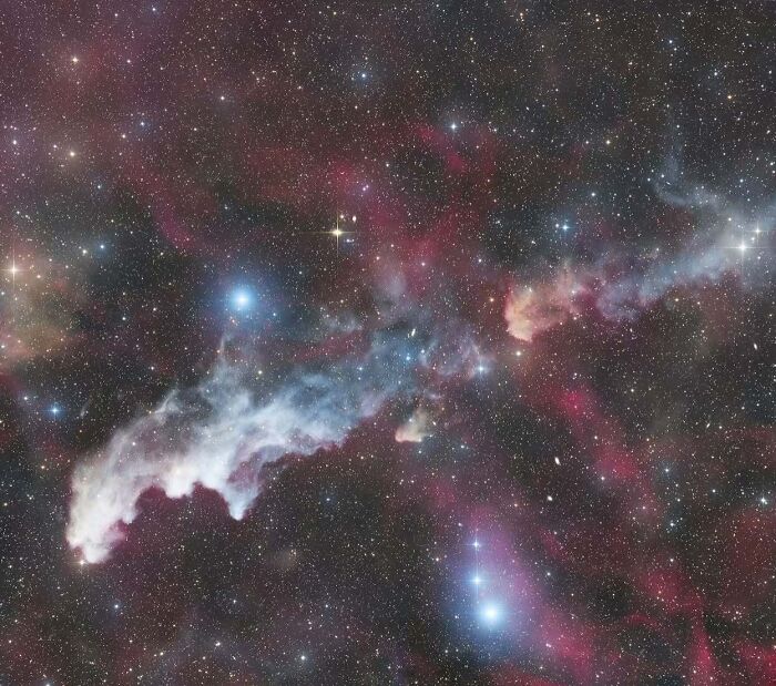 Astrophotography featuring a vibrant nebula with bright stars in the night sky, captured by Soumyadeep Mukherjee.