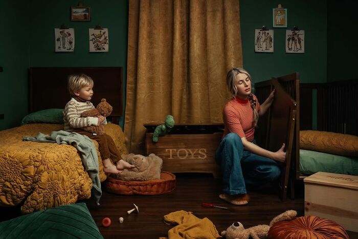 Mother and child in a cozy room with toys, capturing the magic of childhood through a mother's lens.
