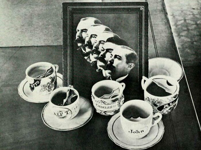 Vintage photo of surreal mustache cups with faces, illustrating ridiculous retro design.