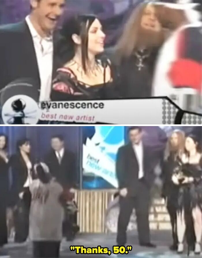 Band members on stage at an awards show, with a humorous interaction captioned "Thanks, 50," creating a scandalous moment.