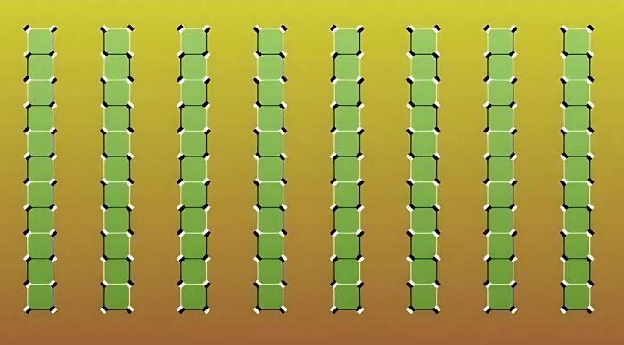 Seven green bamboo-like columns create an optical illusion questioning if they are parallel.