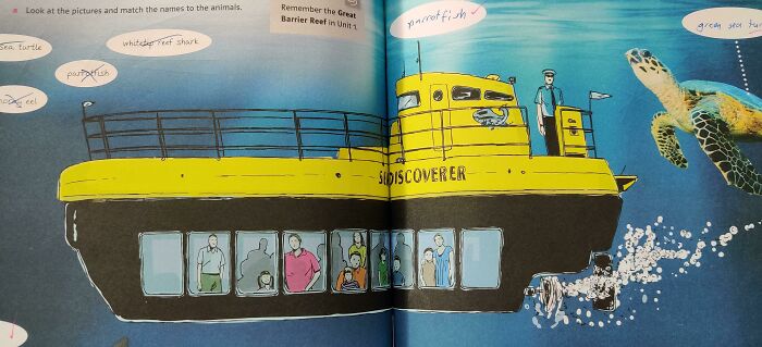 Yellow submarine design with drawings of people inside and marine animals outside in a child's illustrated book.
