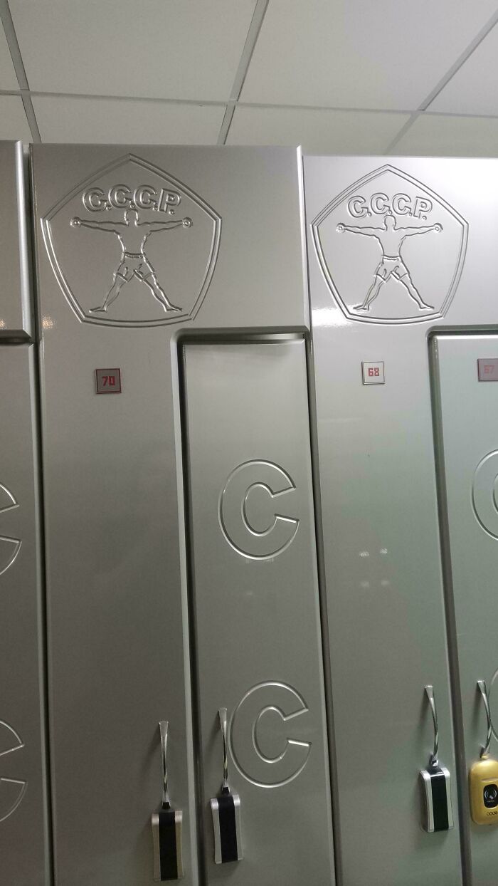 Soviet-themed locker doors with CCCP emblems in a gym.