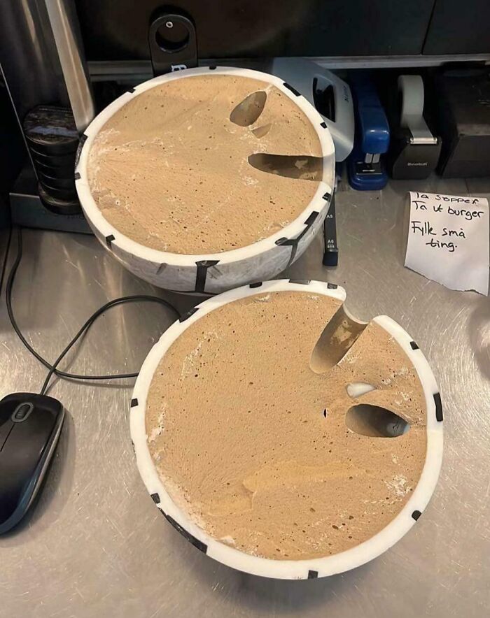 Unique sand sculpture of apple cores, showcasing creativity and proving our world is far from boring.