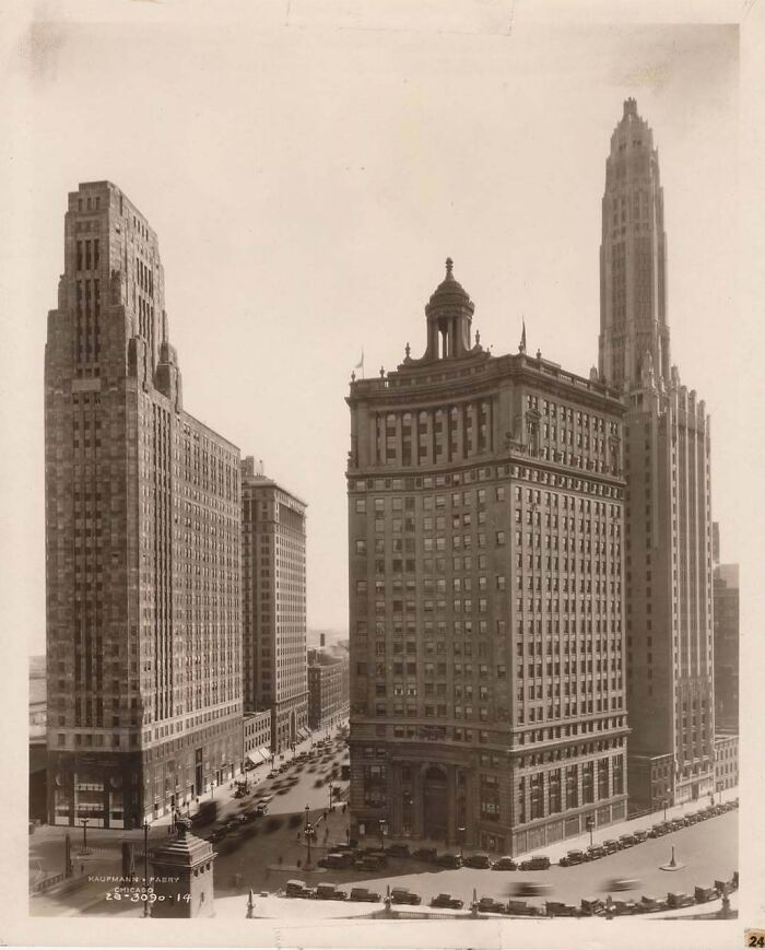 Historic American architecture with three iconic skyscrapers in a vintage cityscape view.