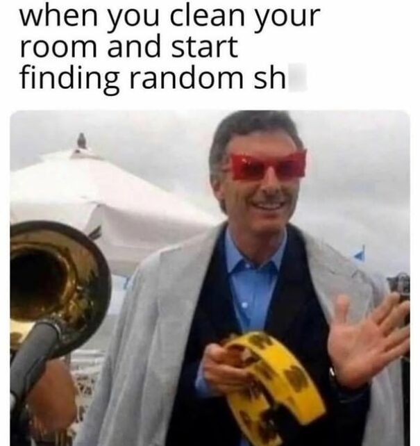 Man with tambourine and red glasses, caption joking about finding things while cleaning, showcasing Scots humor.