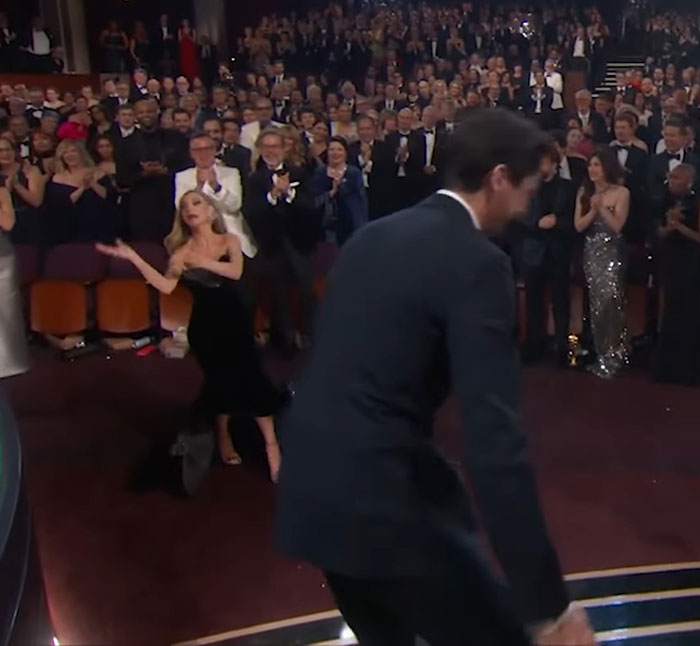 Audience applauding during Adrien Brody's Oscars speech, capturing a viral moment. Audience applauding during Adrien Brody's Oscars speech, capturing a viral moment.