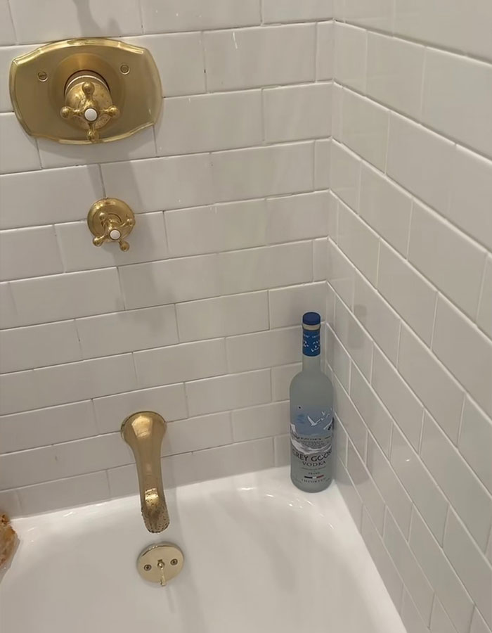 Gold shower fixtures with a vodka bottle in the corner, linked to Benny Blanco's unusual shower habit. Gold shower fixtures with a vodka bottle in the corner, linked to Benny Blanco's unusual shower habit.
