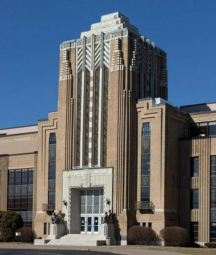 Stunning example of old American architecture with intricate brickwork and tall geometric design.