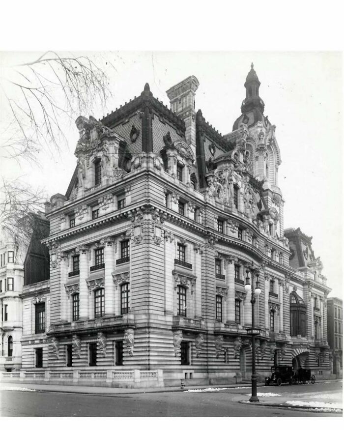 Historic American architecture featuring an ornate, multi-story building with intricate details and classic styling.