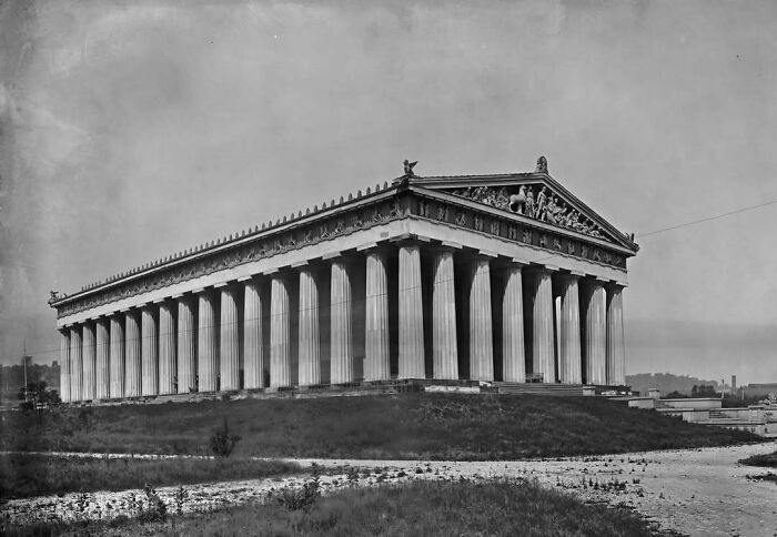 Historic American architecture featuring a grand columned building, reminiscent of classical Greek design.
