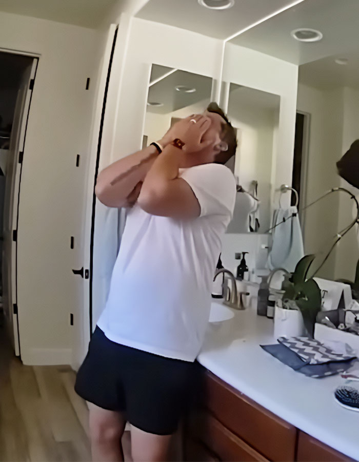 Man distressed, facing mirror in bathroom; related to plea deal rejection in hot car case. Man distressed, facing mirror in bathroom; related to plea deal rejection in hot car case.