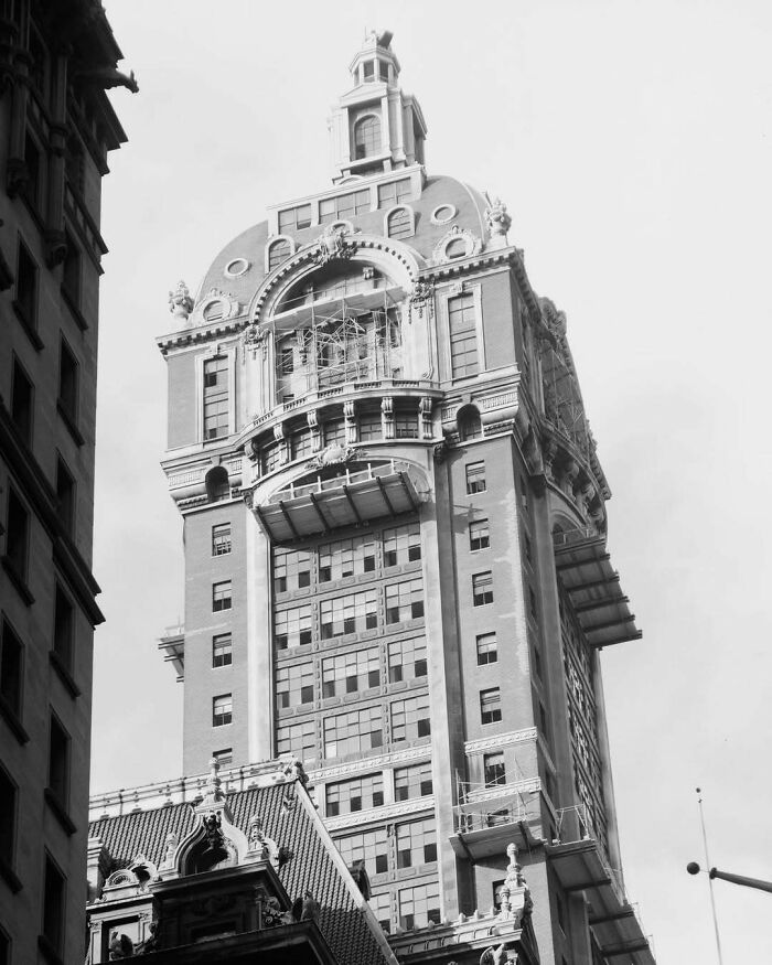 Historic American architecture featuring an ornate skyscraper with elaborate facade and unique design elements.