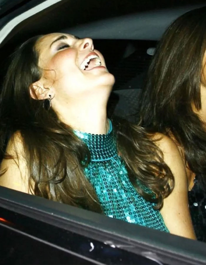 ```plaintext Woman joyfully laughing in a car, wearing a turquoise sequin dress, showing a stunning smile. ``` ```plaintext Woman joyfully laughing in a car, wearing a turquoise sequin dress, showing a stunning smile. ```