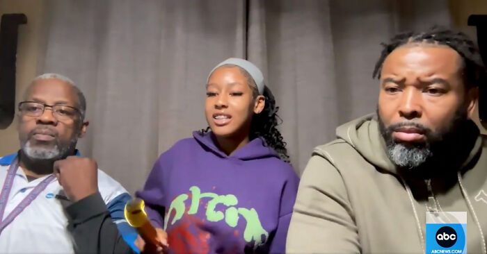 Runner shares video to prove innocence, sitting with two men during an interview. Runner shares video to prove innocence, sitting with two men during an interview.