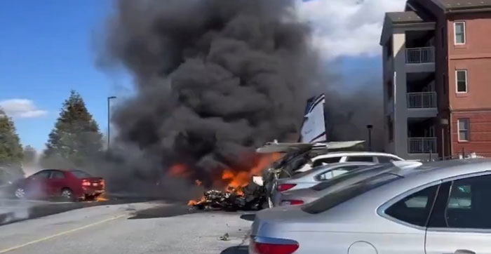 Small plane crash-lands in Pennsylvania suburb, multiple injuries, with smoke and fire near parked cars. Small plane crash-lands in Pennsylvania suburb, multiple injuries, with smoke and fire near parked cars.