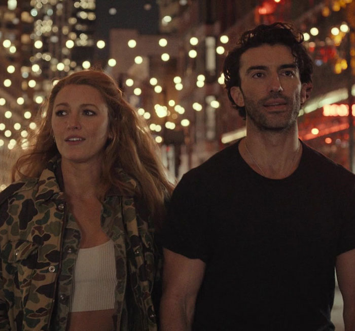 Blake Lively and a companion walk under city lights, involved in legal drama discussions. Blake Lively and a companion walk under city lights, involved in legal drama discussions.