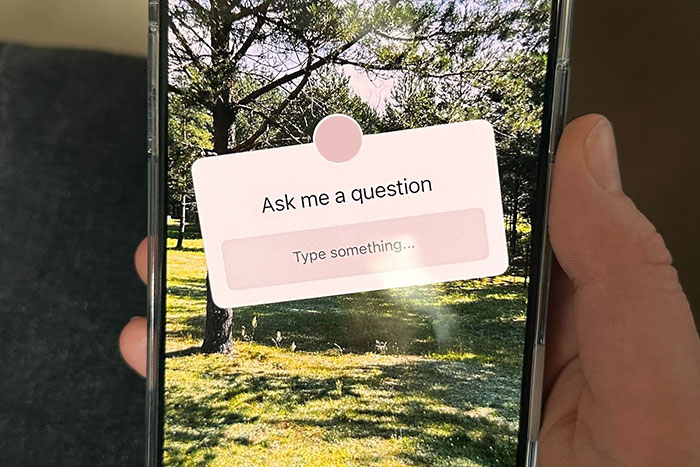 Phone with question box over a scenic background, relating to a bride confused about wedding guest choices. Phone with question box over a scenic background, relating to a bride confused about wedding guest choices.