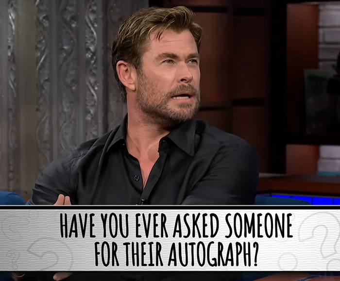 Chris Hemsworth discussing a question about autographs on a talk show, reflecting on past experiences. Chris Hemsworth discussing a question about autographs on a talk show, reflecting on past experiences.