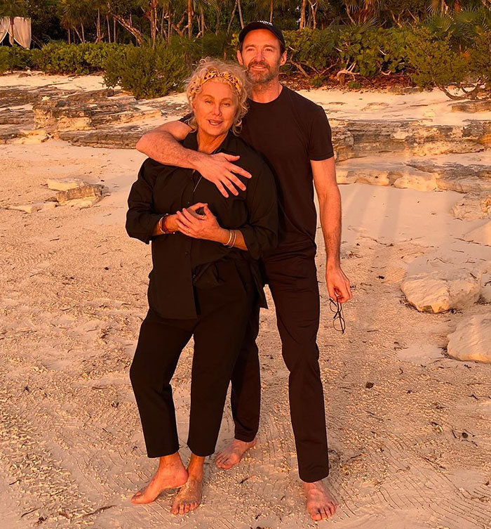 Couple on a beach, highlighting divorce snag amid sunset scene. Couple on a beach, highlighting divorce snag amid sunset scene.