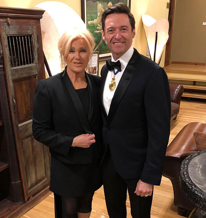 A couple in formal attire, highlighting a moment amid divorce challenges. A couple in formal attire, highlighting a moment amid divorce challenges.