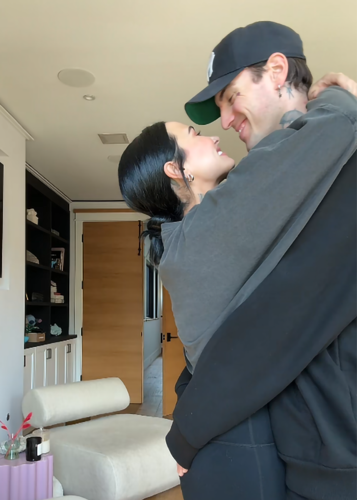 Couple embraces in cozy room, highlighting Ozempic weight loss transformation. Couple embraces in cozy room, highlighting Ozempic weight loss transformation.