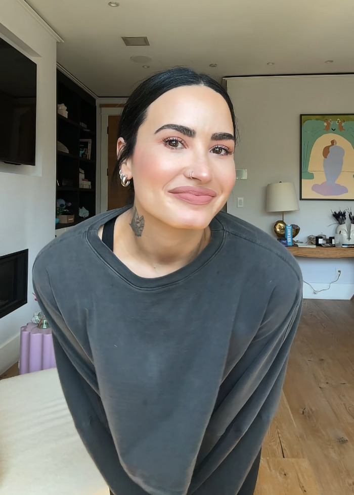 Demi Lovato showcases weight loss transformation in a casual indoor setting. Demi Lovato showcases weight loss transformation in a casual indoor setting.