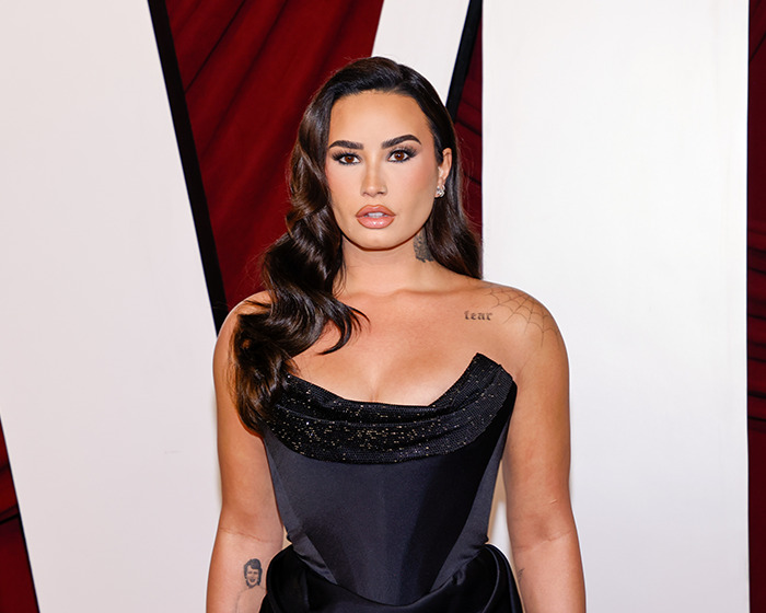 Woman in a sleek black dress, showcasing a stunning weight loss transformation, red carpet background. Woman in a sleek black dress, showcasing a stunning weight loss transformation, red carpet background.