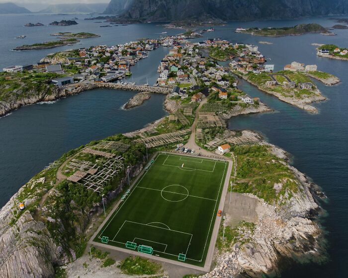 A remote soccer field on a rocky island surrounded by water, one of the iconic cathedrals of soccer worldwide.