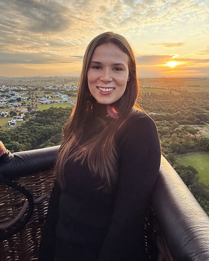 A woman in a hot air balloon at sunset, possibly the viral flyer from the controversial seating incident. A woman in a hot air balloon at sunset, possibly the viral flyer from the controversial seating incident.