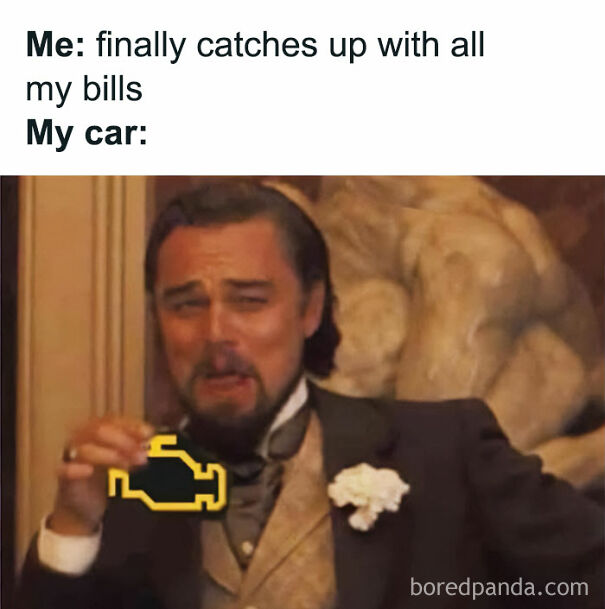 Man in suit laughing with engine light, showcasing Scottish humor.