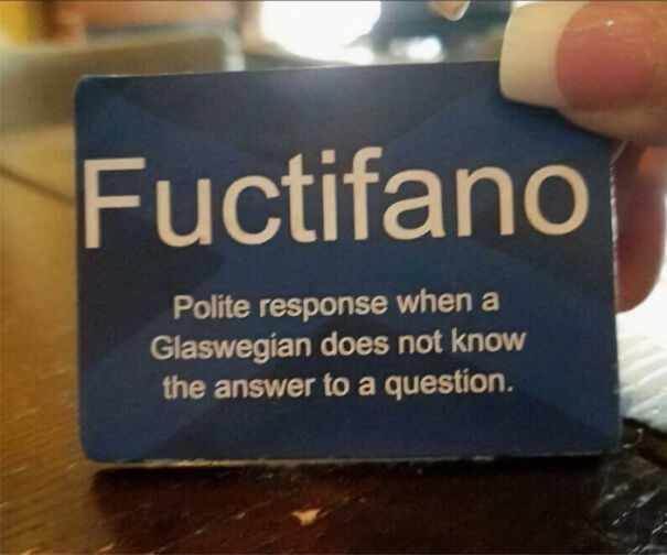 Card with Scottish humor showing the word "Fuctifano" and its meaning, highlighting Glasgow wit.