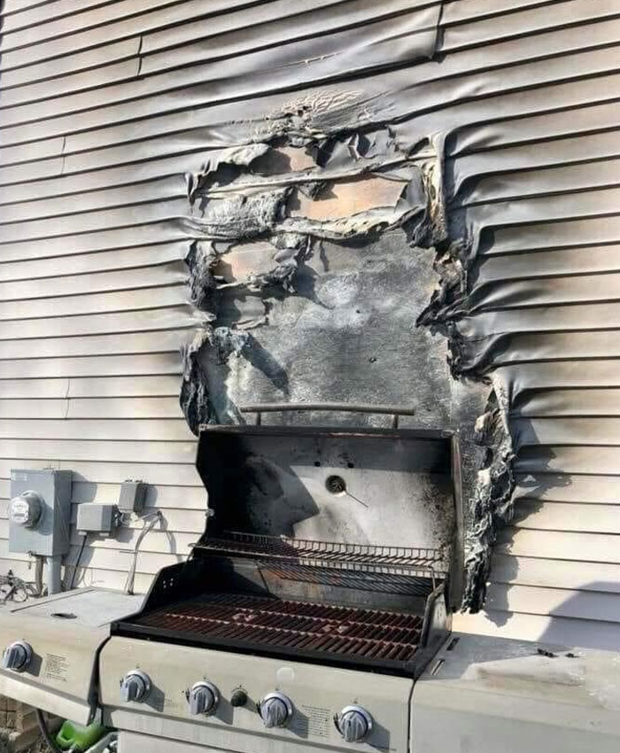 Melted siding caused by grill placement leading to poor home decision damage.