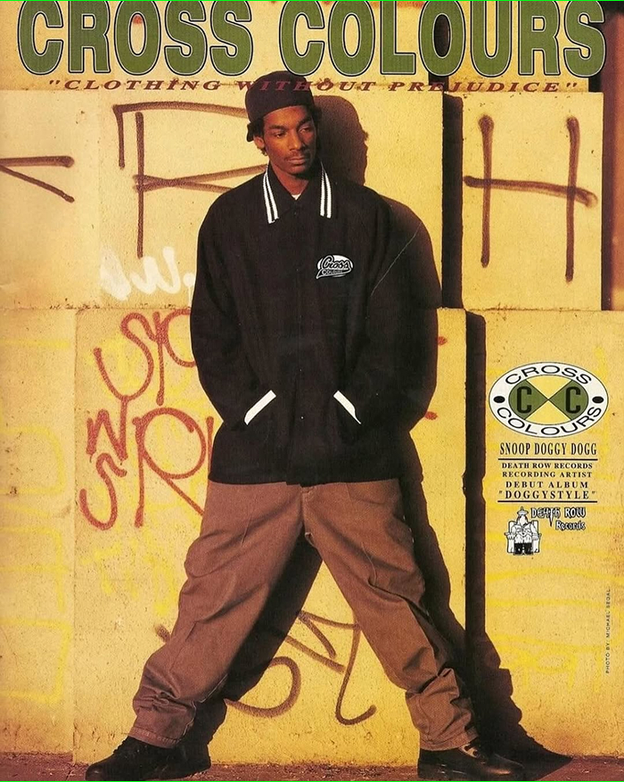 Snoop Dogg posing in streetwear for Cross Colours, highlighting rap royalty and business influence. Snoop Dogg posing in streetwear for Cross Colours, highlighting rap royalty and business influence.