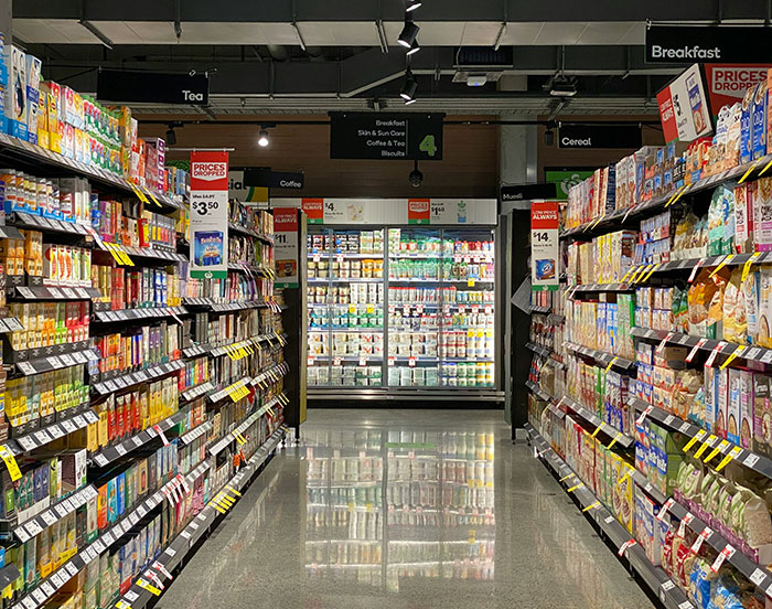 Grocery aisle in the US showcasing current prices, highlighting concerns over insane grocery costs in America. Grocery aisle in the US showcasing current prices, highlighting concerns over insane grocery costs in America.