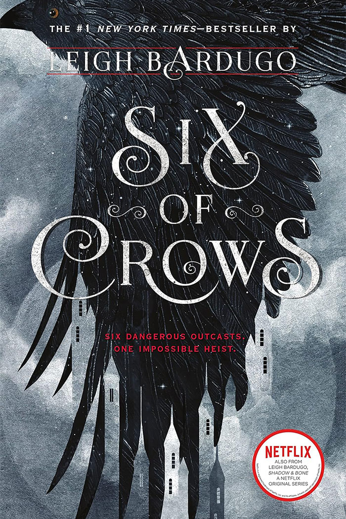 Cover of 'Six of Crows' by Leigh Bardugo, featuring a crow with wings extended. Cover of 'Six of Crows' by Leigh Bardugo, featuring a crow with wings extended.