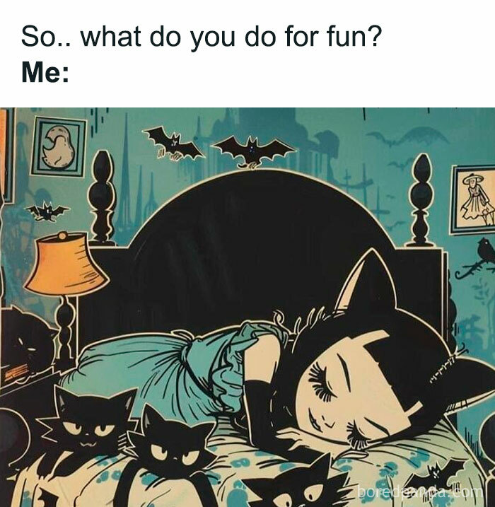 Cartoon girl in cat pajamas sleeping on bed with black cats, surrounded by bats; relatable "just girly things" meme.