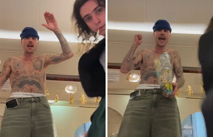 Justin Bieber with blue beanie and tattoos gesturing animatedly, held phone and popcorn. Justin Bieber with blue beanie and tattoos gesturing animatedly, held phone and popcorn.