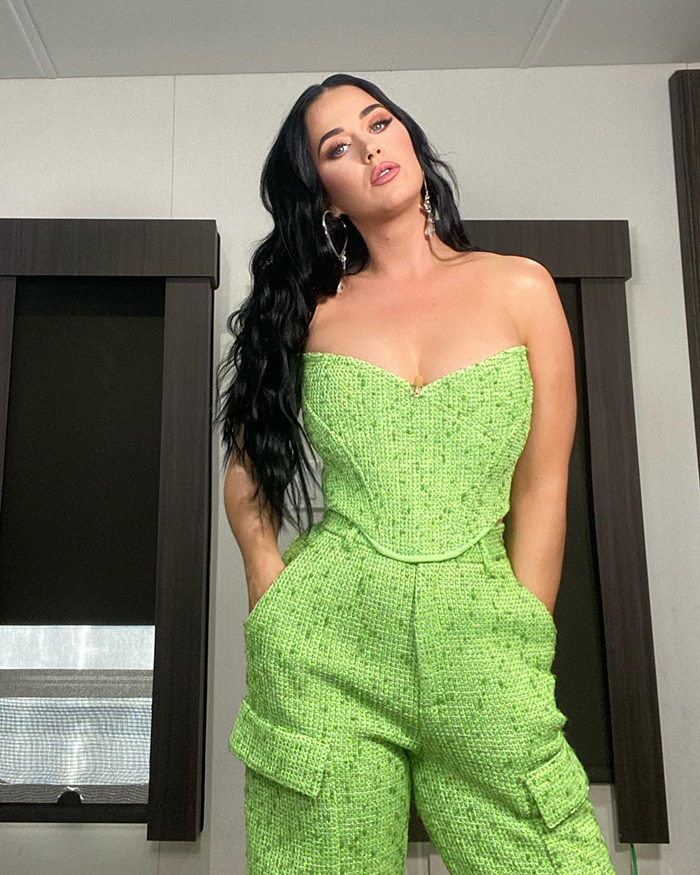 Alt text: Woman in green outfit showing weight loss. Alt text: Woman in green outfit showing weight loss.