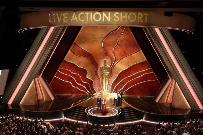 Oscars 2025 Live Action Short award stage with audience watching the ceremony. Oscars 2025 Live Action Short award stage with audience watching the ceremony.
