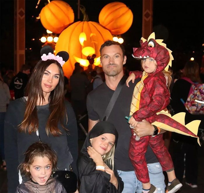 Family at a theme park with large pumpkin decoration, related to Celestial Seed discussion. Family at a theme park with large pumpkin decoration, related to Celestial Seed discussion.