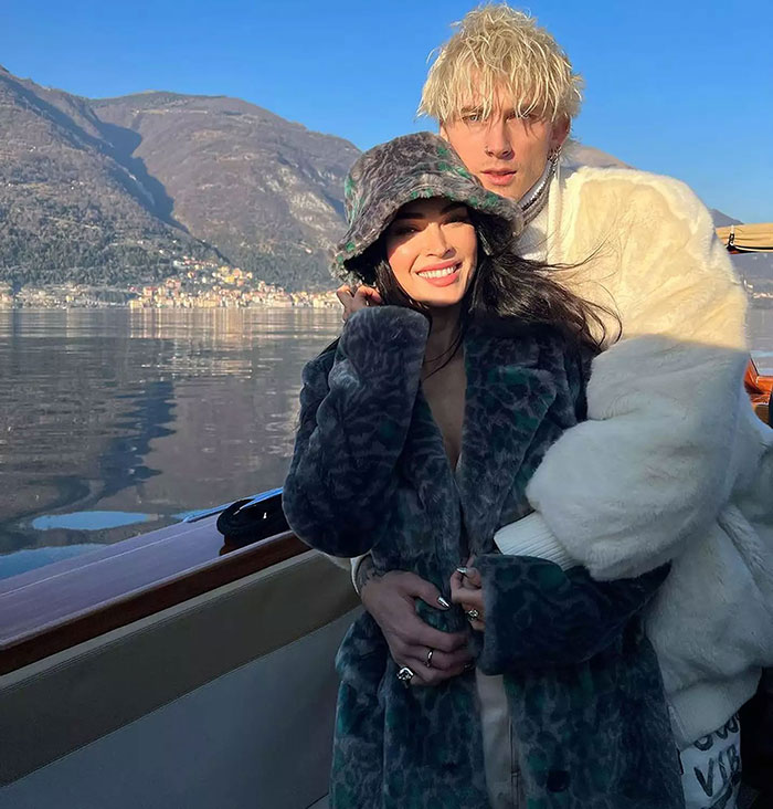 Couple embracing on a boat with scenic mountain backdrop, sparking "Celestial Seed" name confusion. Couple embracing on a boat with scenic mountain backdrop, sparking "Celestial Seed" name confusion.