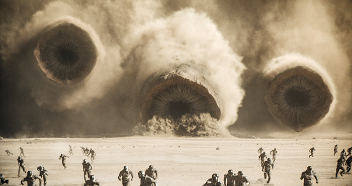 Futuristic scene with giant sandworms in a desert landscape from the movie Dune: Part Two. Futuristic scene with giant sandworms in a desert landscape from the movie Dune: Part Two.