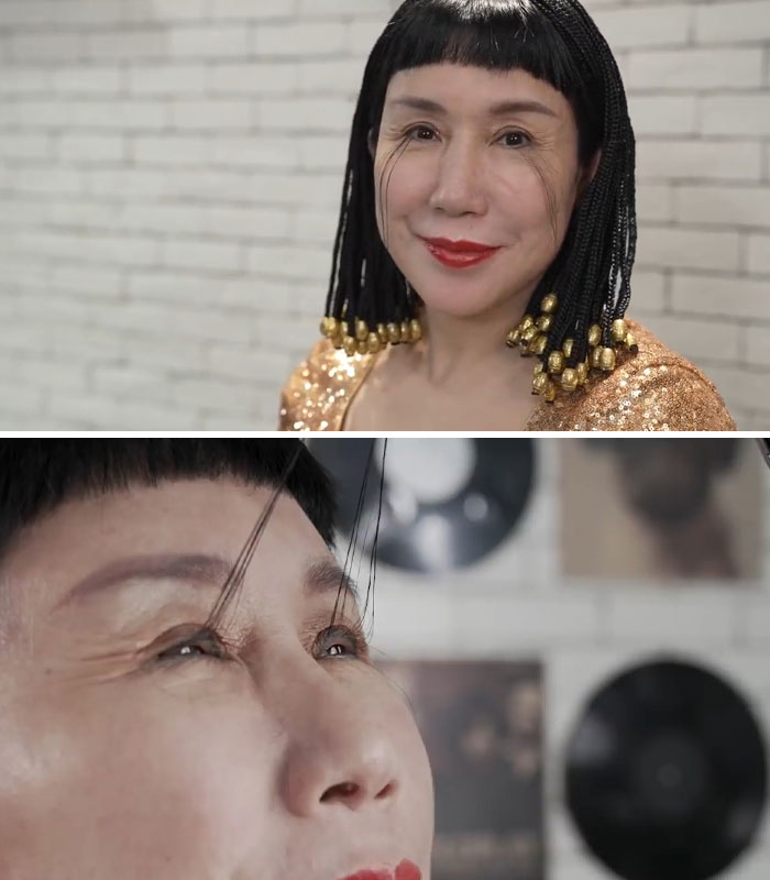 Woman with long eyelash extensions in a sparkling gold dress, showcasing our world's unique styles.