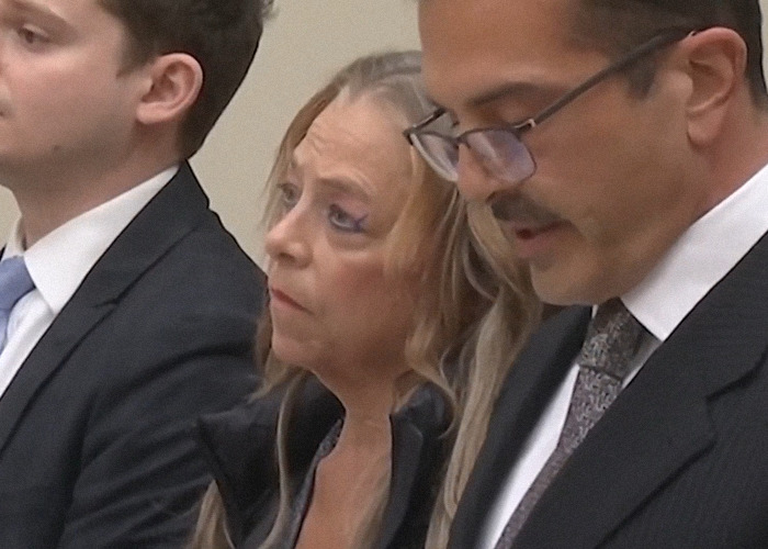 Woman in court, a keyword from the article title: mom allegedly imprisoned stepson. Woman in court, a keyword from the article title: mom allegedly imprisoned stepson.