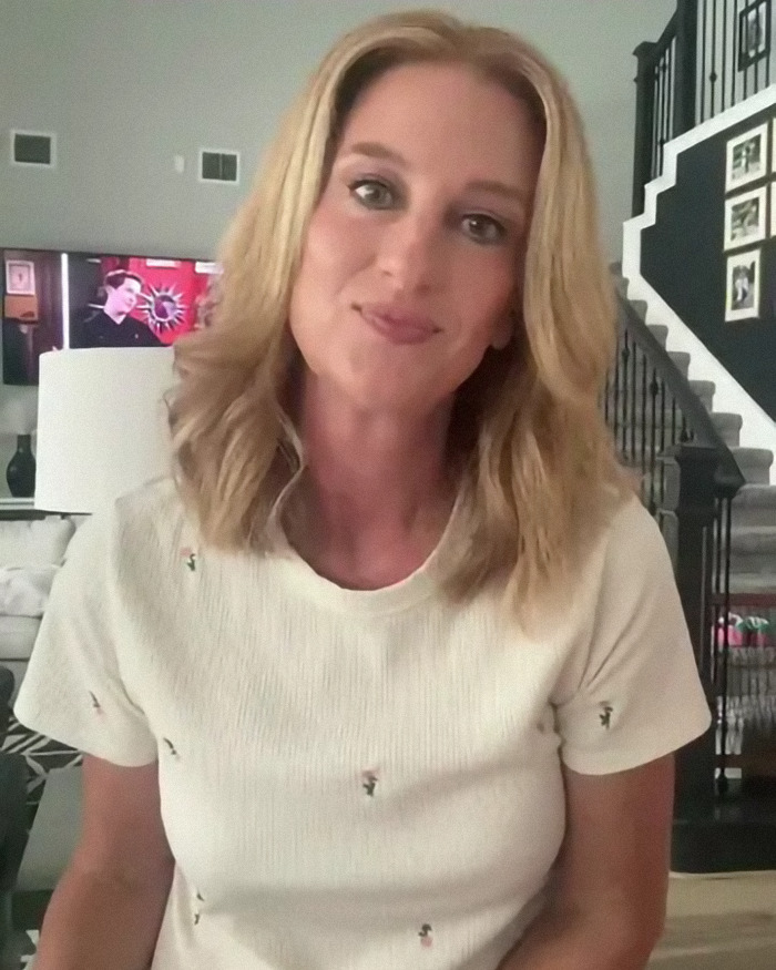 Woman in white shirt discussing subtle signs of heart attack in a living room setting. Woman in white shirt discussing subtle signs of heart attack in a living room setting.