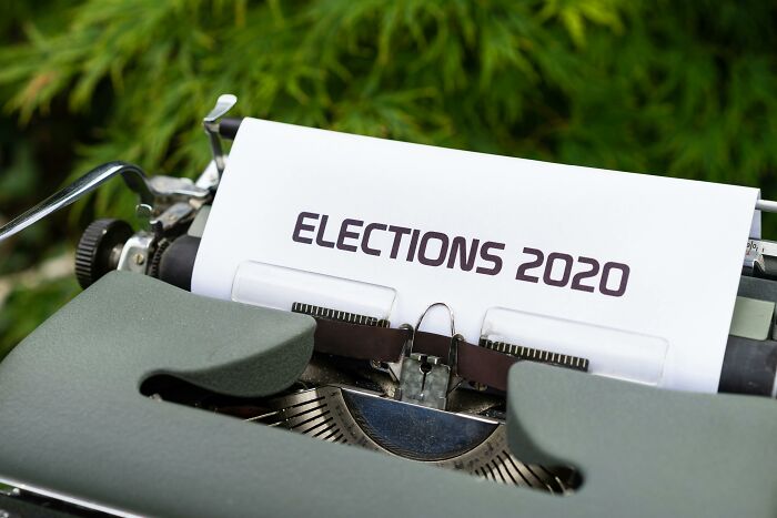 Typewriter with "Elections 2020" paper, representing common misconceptions in public beliefs.