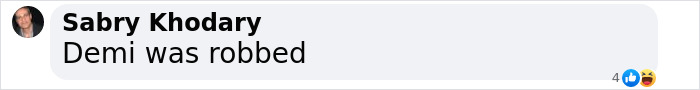 Comment on Demi's Oscars reaction, stating "Demi was robbed" with user profile image. Comment on Demi's Oscars reaction, stating "Demi was robbed" with user profile image.