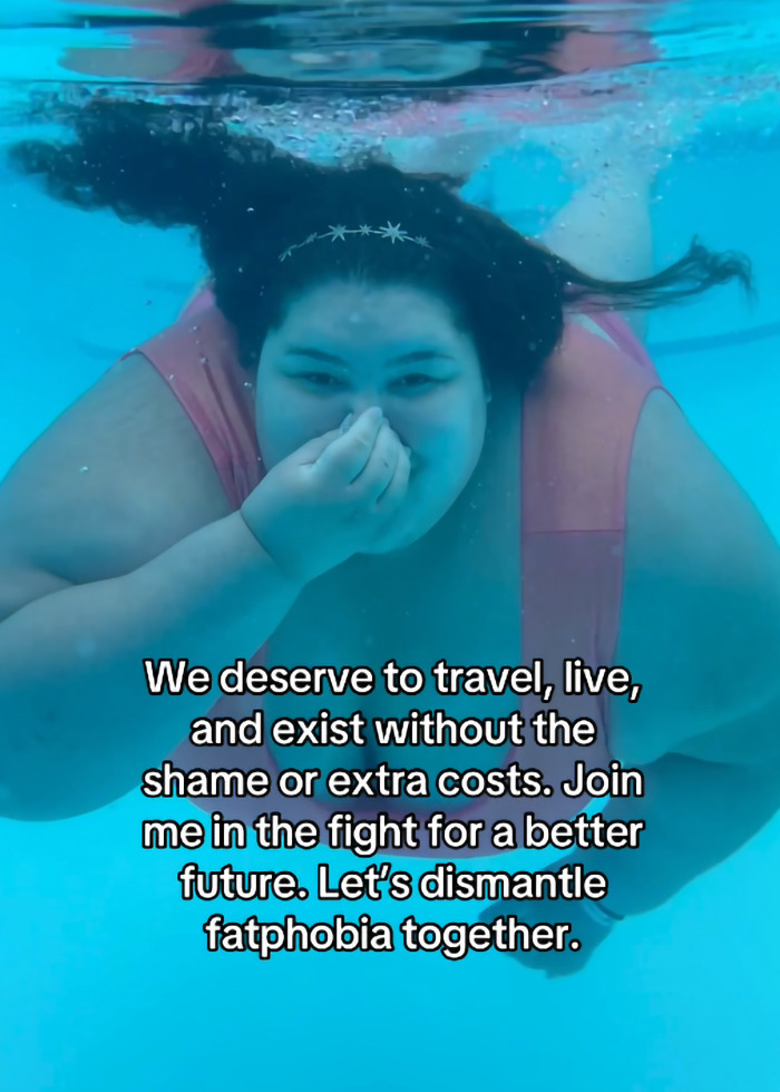 Plus-size woman swimming underwater, challenging fatphobia and advocating against extra costs for travel. Plus-size woman swimming underwater, challenging fatphobia and advocating against extra costs for travel.
