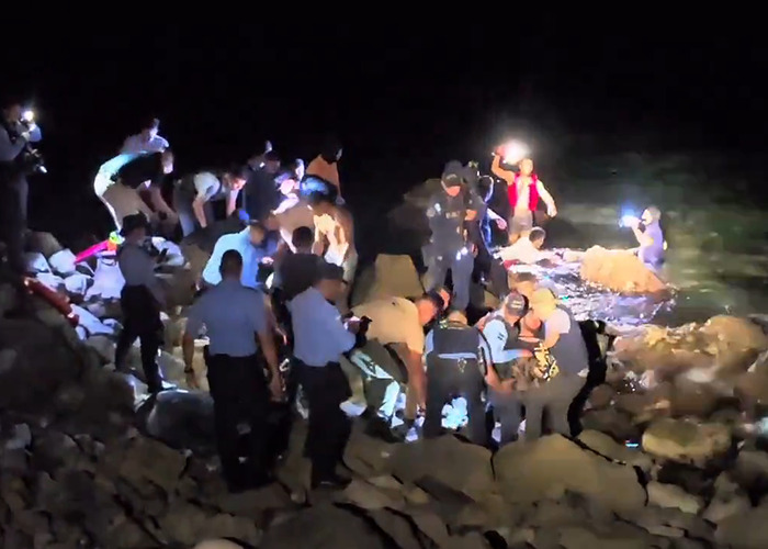 Rescue team responds at plane crash site near remote island at night. Rescue team responds at plane crash site near remote island at night.
